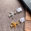 Airplane Kindle Charm Set – Gold & Silver E-Reader Dust Plugs