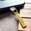 I Love Books Kindle Charm for book lovers and bookworms. Gold e-reader dust plug, Kobo charm and phone charm. A cute gift for Kindle readers.